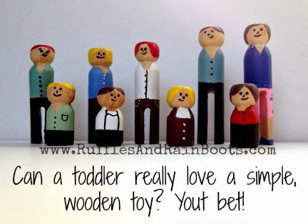This is a picture of a simple, wood toy crafted by RufflesAndRainBoots.com