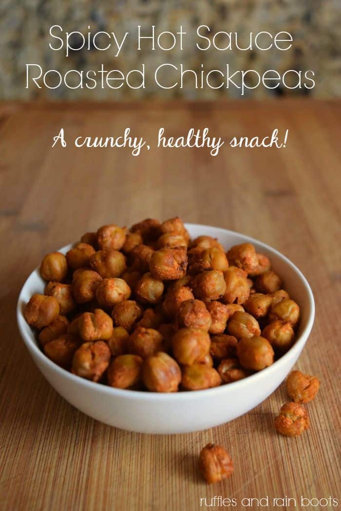 Make these easy roasted chickpeas with just a hint of spicy hot sauce. SO good! #rufflesandrainboots #chickpea #spicy #paleo