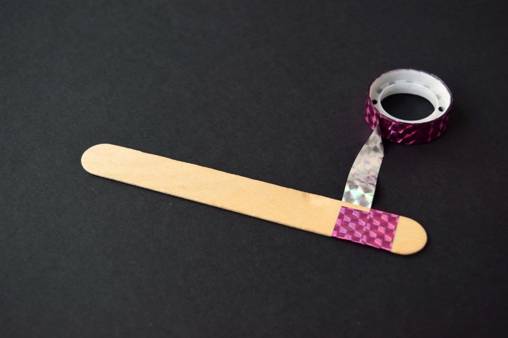 Make a quick date night jar using craft sticks and washi tape