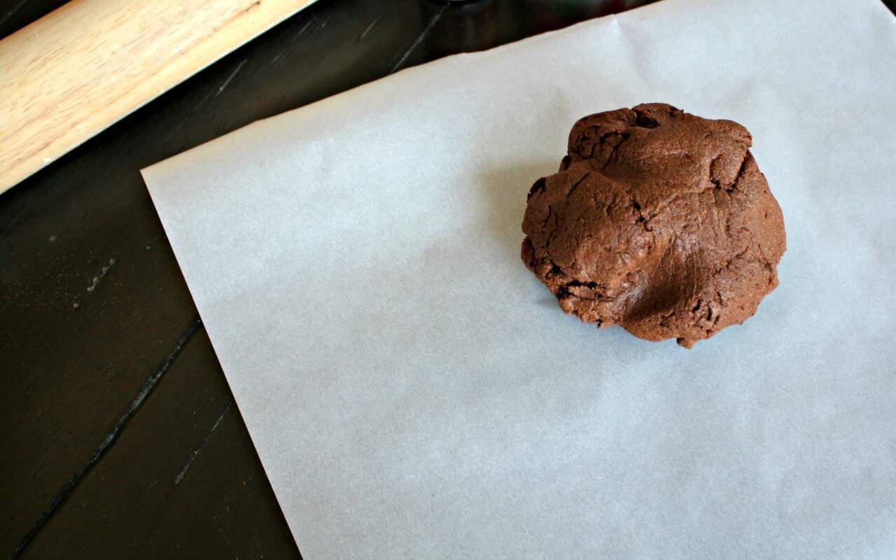 Roll cinnamon dough into a ball and use a rolling pin to flatten