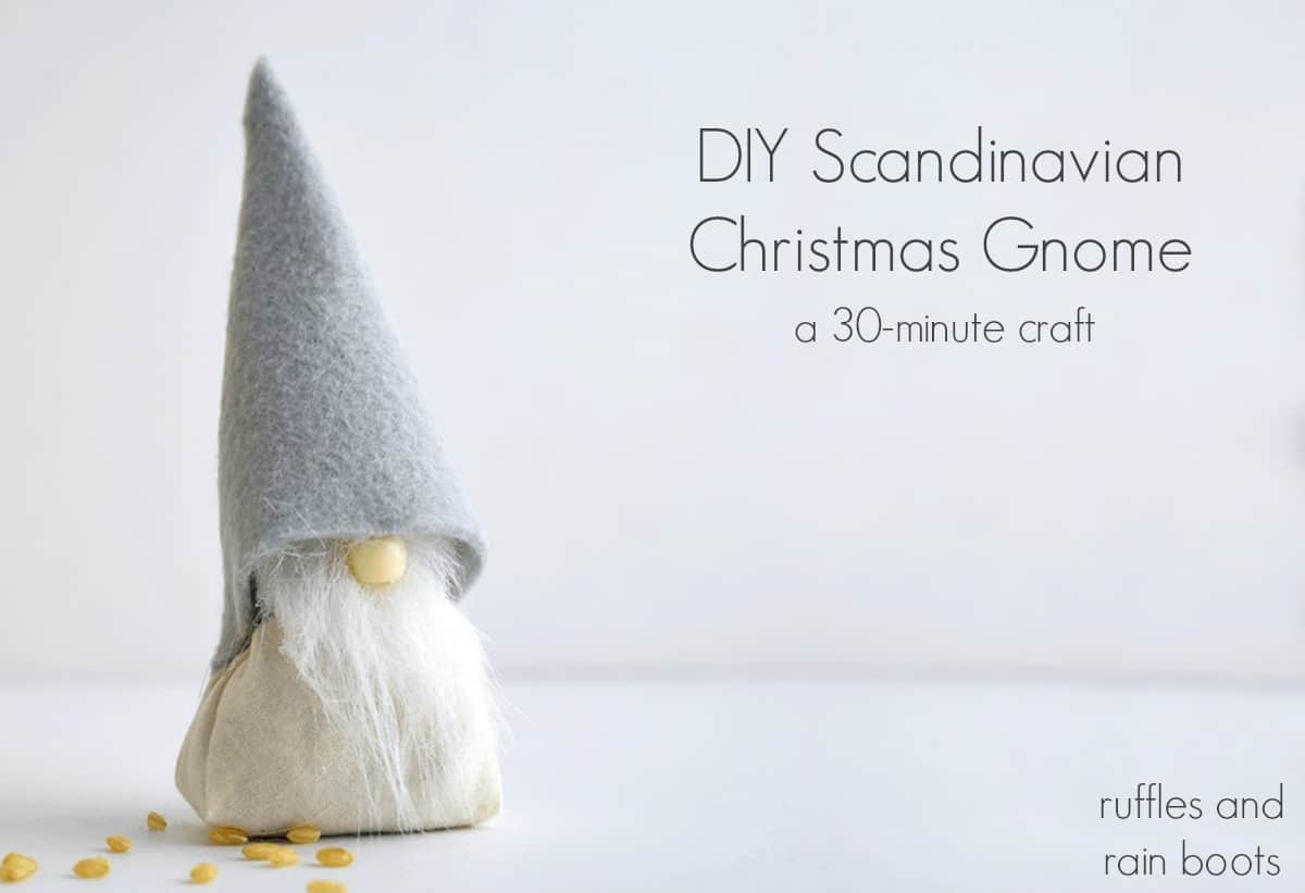 Horizontal close up image of a gray felt hat Scandinavian tomte filled with rice with text which reads DIY Scandinavian Christmas gnome.