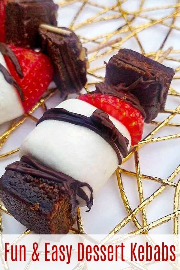 This fun and easy strawberry recipe is fun for all ages. Strawberry brownie kebabs are quick and easy - you'll love them. #strawberry #strawberryrecipes #strawberrydesserts #easydesserts #dessertideas #strawberryseason #kebabs #dessertkebabs #treatkebabs #foodonastick #browniebites #strawberrybrownie #rufflesandrainboots