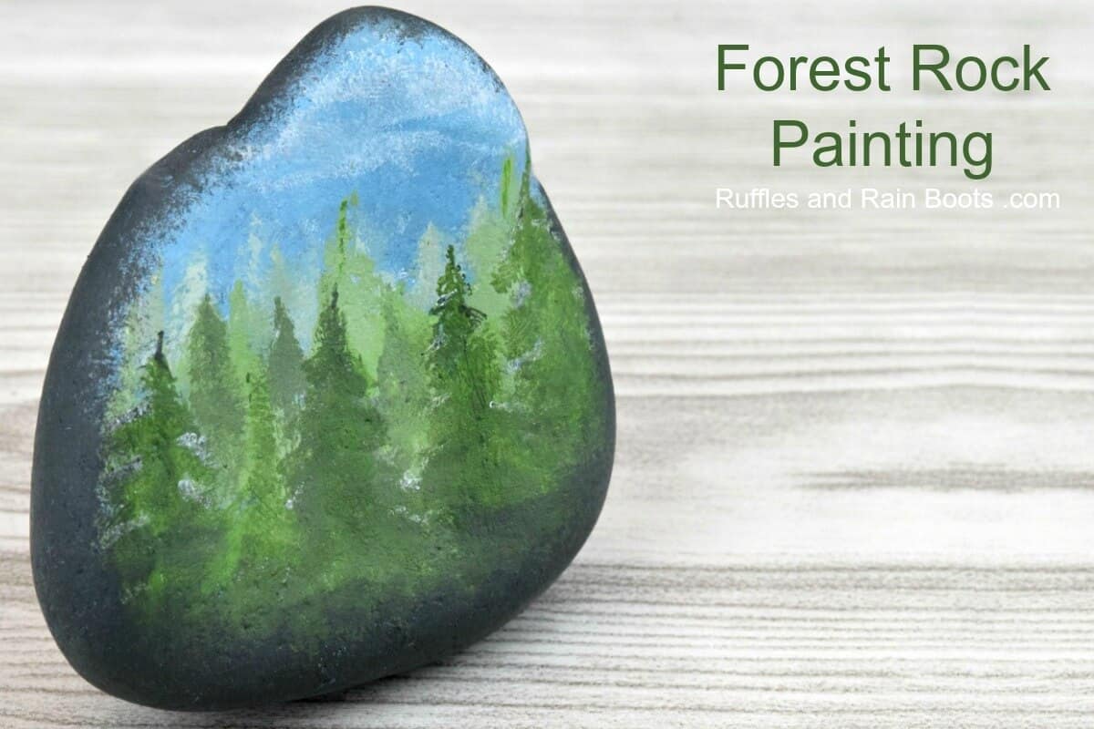 a painted rock with a Fall Rock Painting Forest in One Color