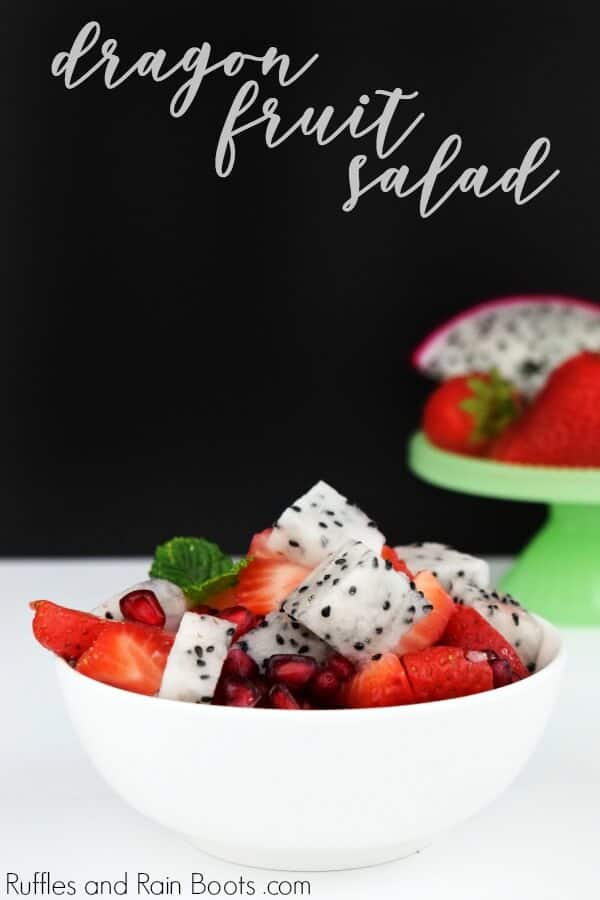 Make this delicious dragon fruit salad recipe and wow everyone! Using dragon fruit, strawberries, and pomegranate arils, it is a crowd-pleaser. #pitaya #dragonfruit #pitayarecipes #dragonfruitrecipes #smoothierecipe #fruitsalad #picnicrecipes #picnicfood #rufflesandrainboots