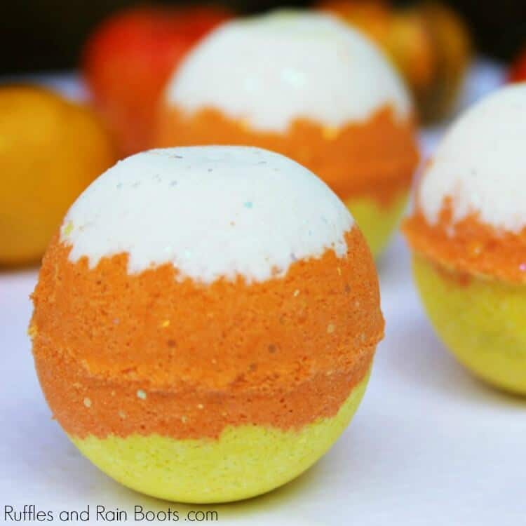 candy corn bath bombs on white table