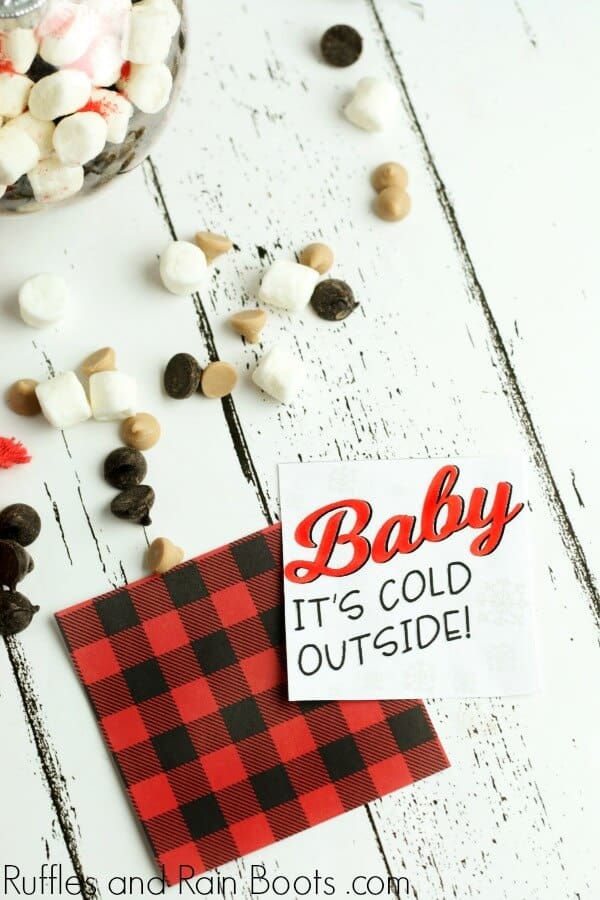 free printable gift tag for hot chocolate ornament with text which reads Baby, It's cold outside