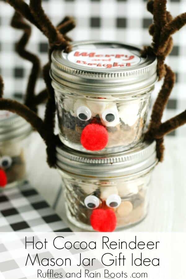 stacked reindeer mason jars filled with peanut butter hot chocolate mix for Christmas gifts