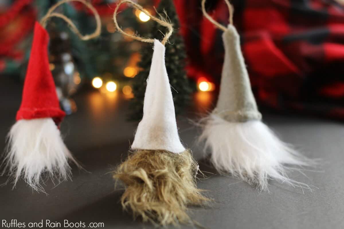 photo of three Swedish gnome ornaments against a Christmas tree
