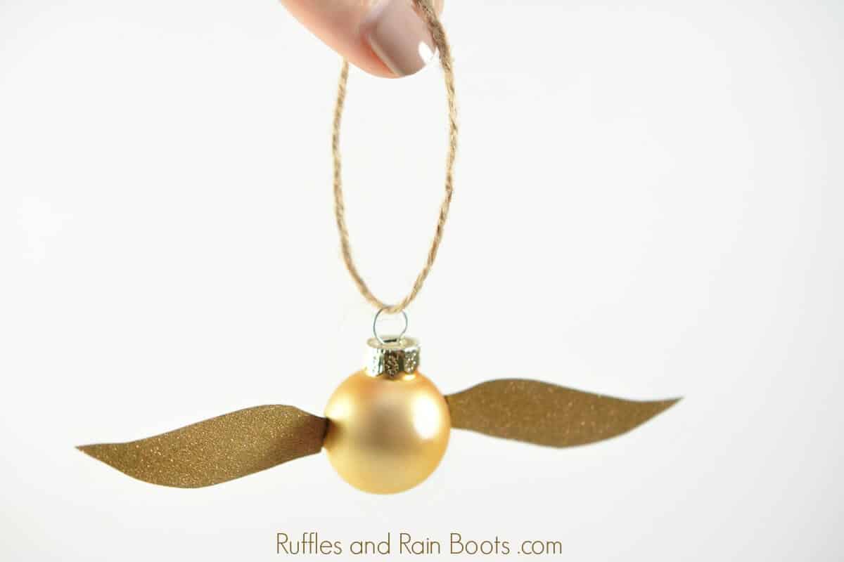 Golden Snitch ornament on white background