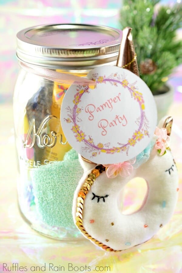 mason jar filled gift for teen girls with beauty products and unicorn ornament
