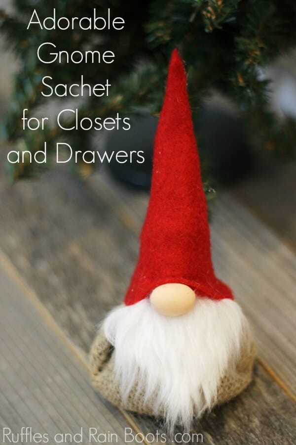 Close up of red hat gnome on wood background with text which reads gnome lavender sachet.