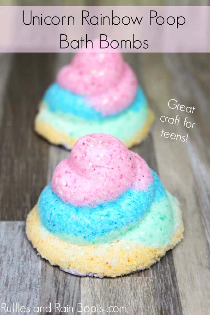 close up of bath fizzies with text which reads unicorn rainbow poop bath bombs