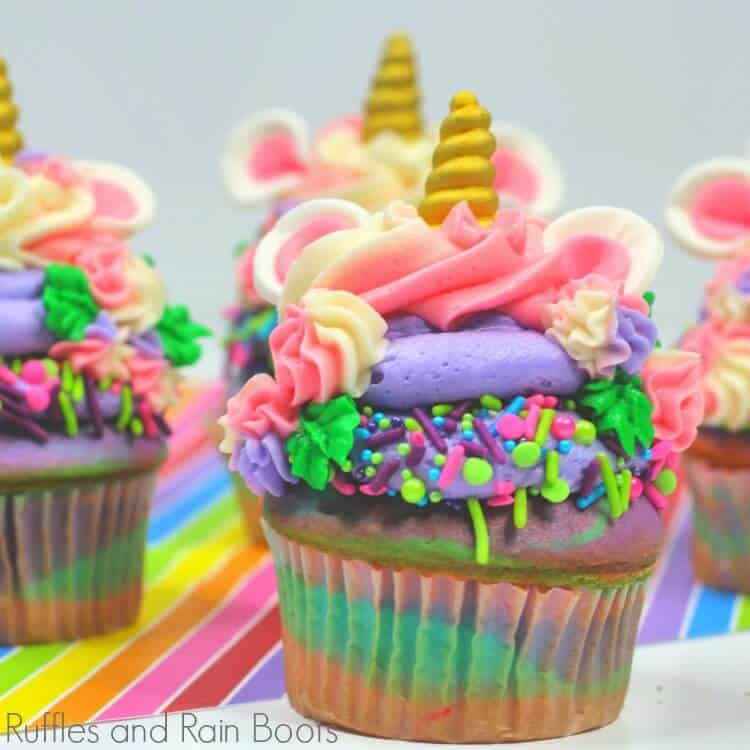 unicorn cupcake on rainbow paper