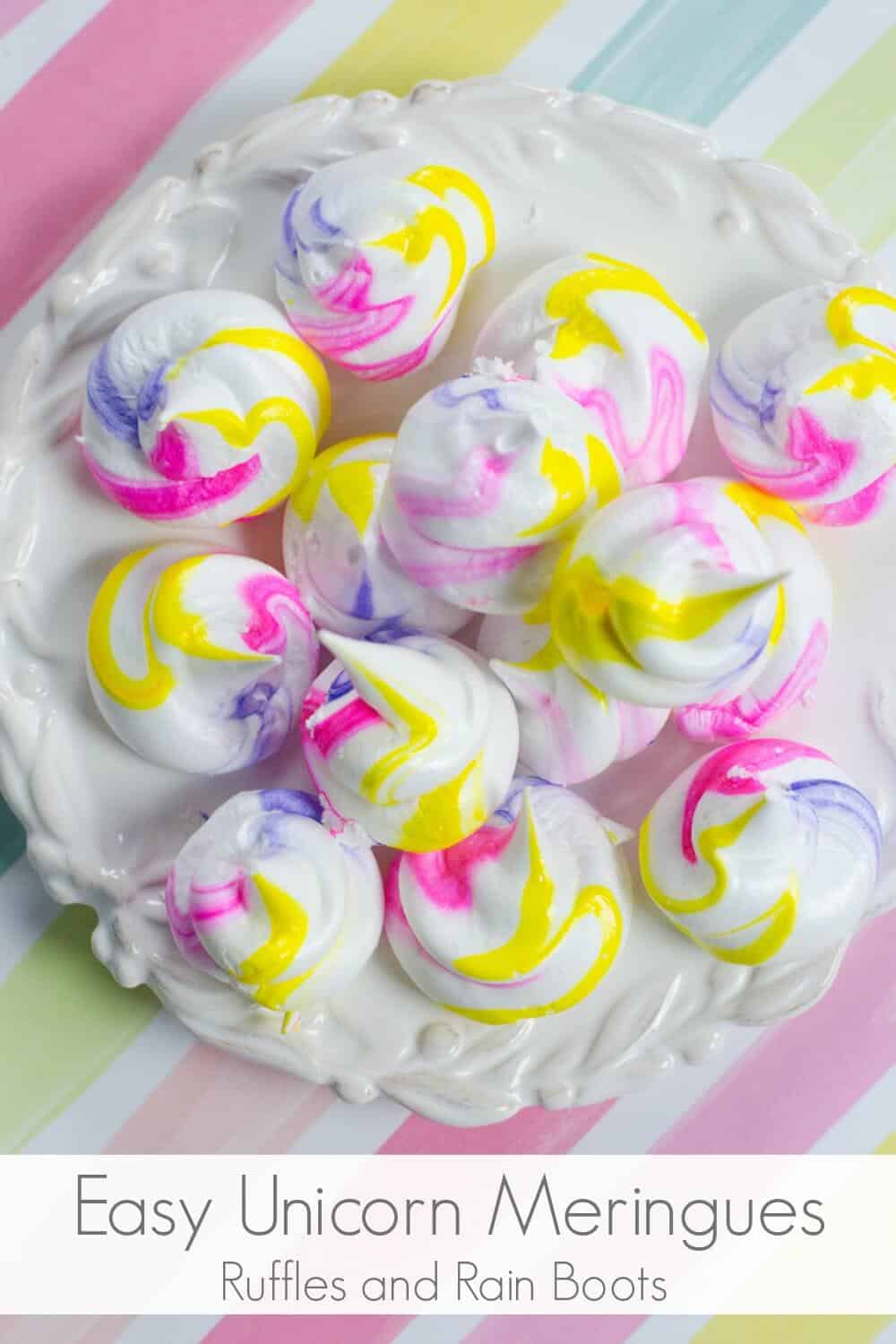 close up of unicorn meringues on white platter with text easy unicorn meringues
