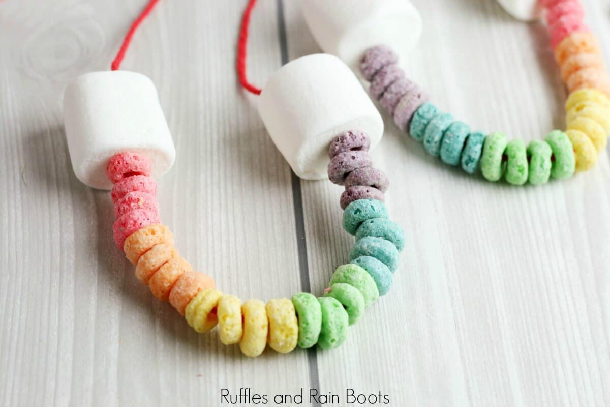rainbow cereal necklace on wood background