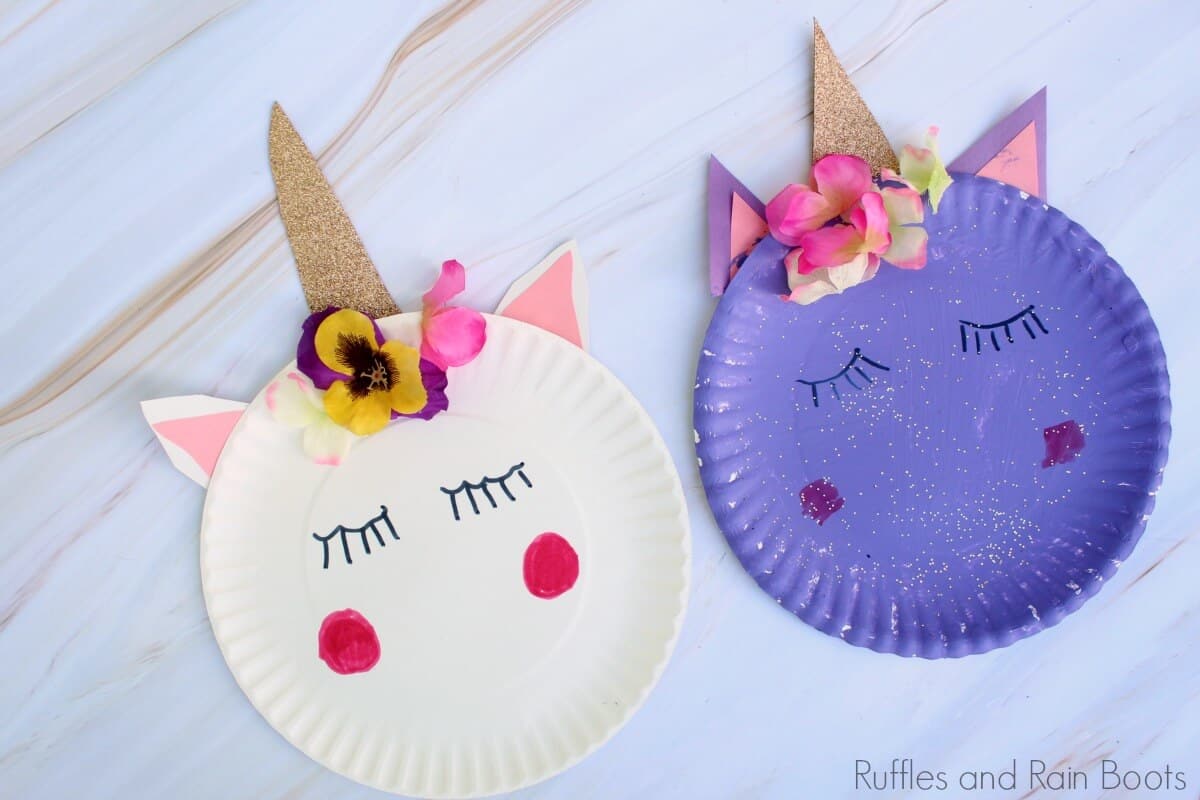 unicorn paper plate craft close up with white and purple plate on white background