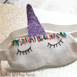 close up of unicorn sleep mask on white table