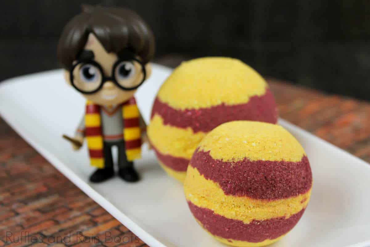 griffindor bath bombs for diy gift idea on a white plate with a harry potter figurine