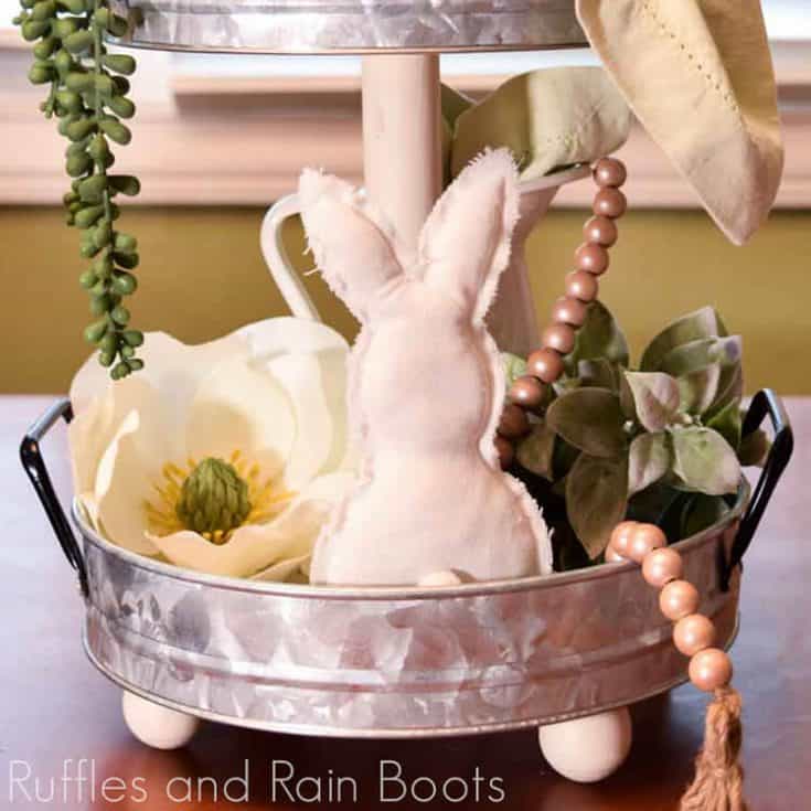 Close up of farmhouse tiered tray styled for Easter