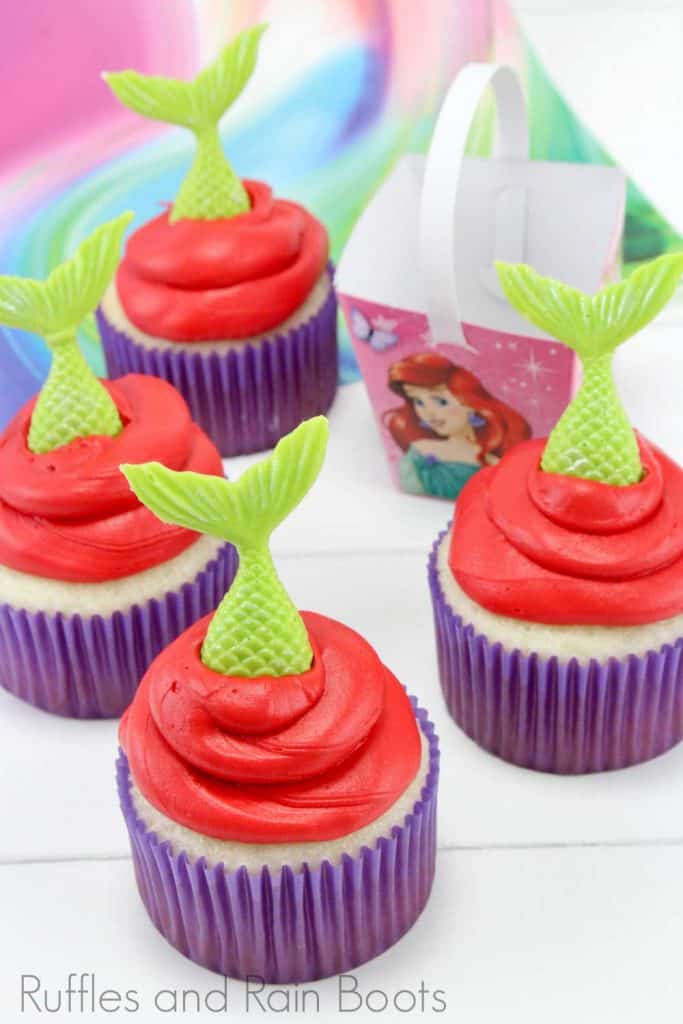little mermaid cupcakes on a white background