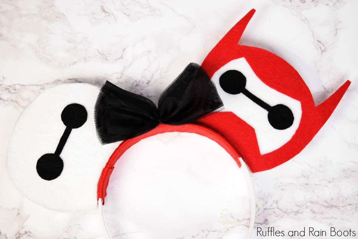 Close up of Baymax Mickey Mouse ears from Big Hero 6 on a white marble background