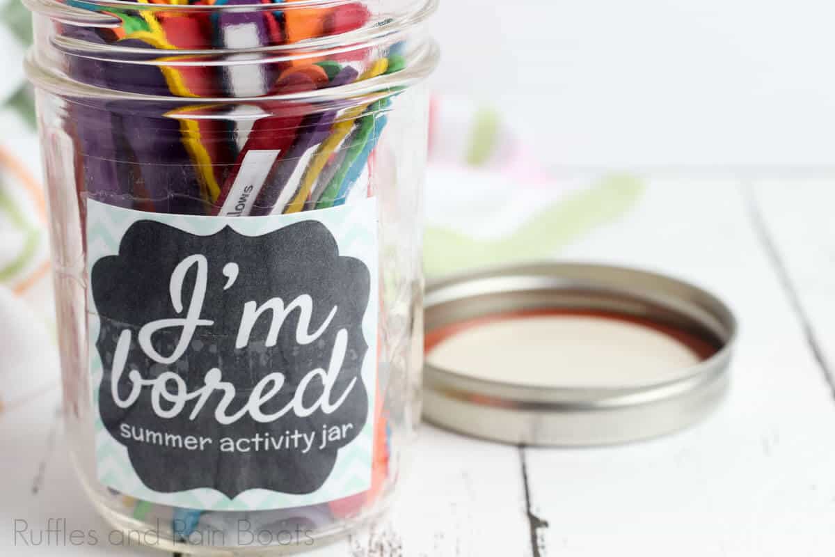 fun summer activity jar I'm bored jar for kids on a white wooden background