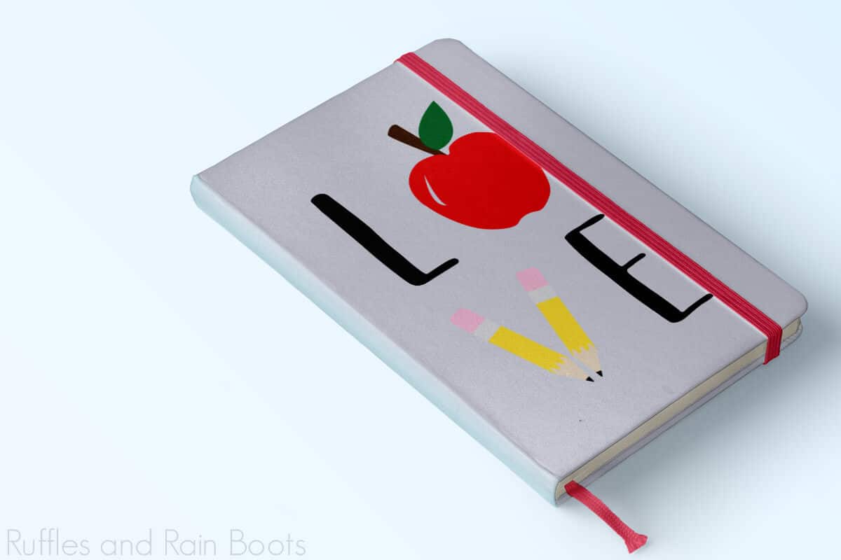 close up of gray notebook with teacher appreciation love svg