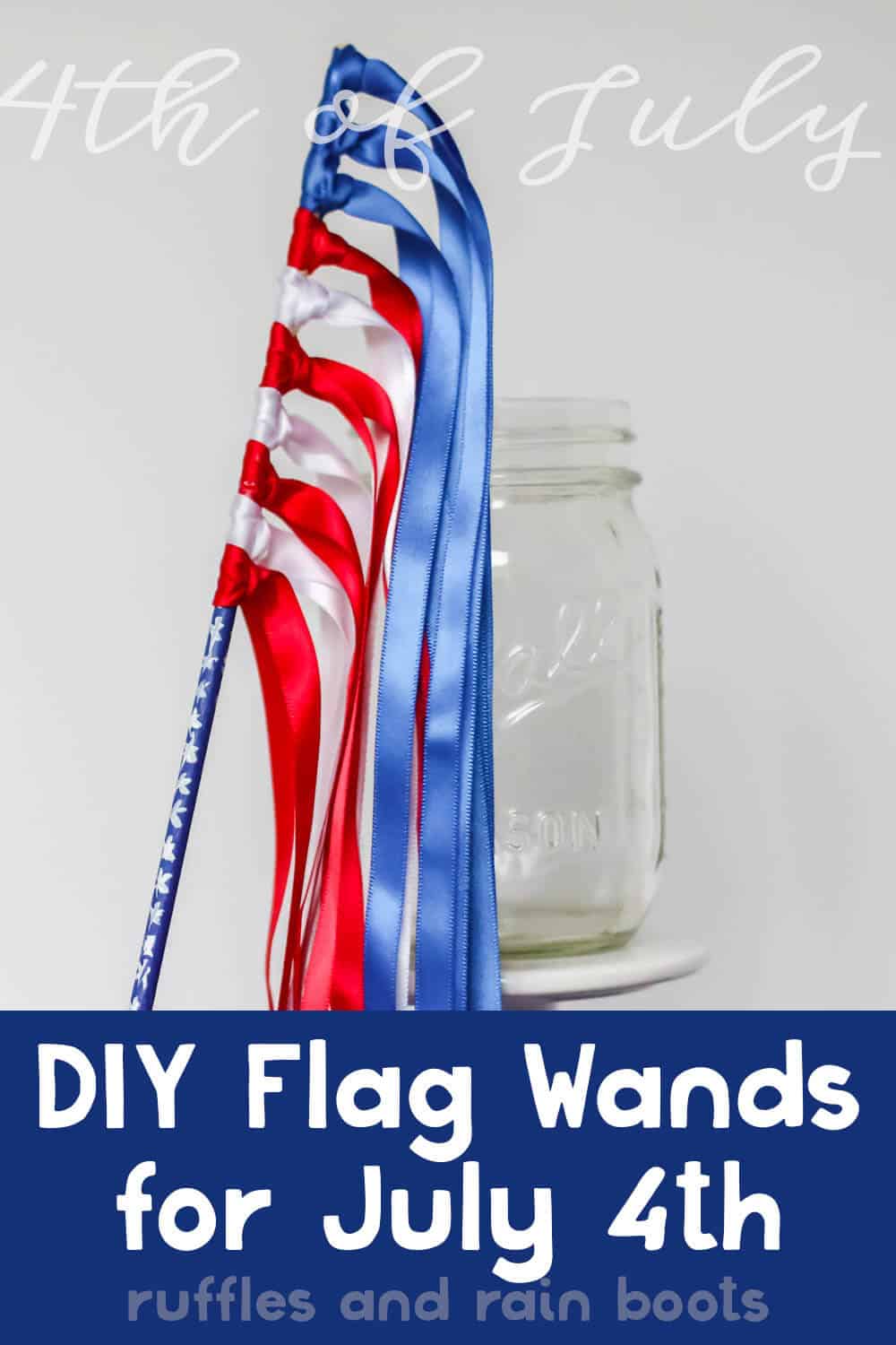 diy flag wands for independence day party leaning on a mason jar on a blue table in front of a white background with text which reads diy flag wands for july 4th