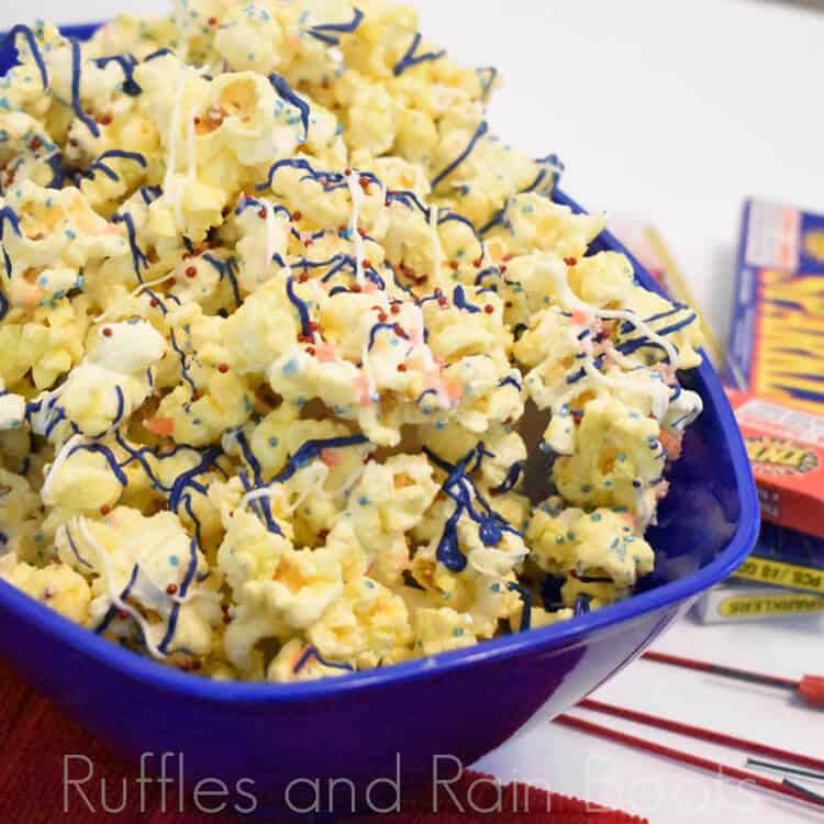 Red white and blue patriotic popcorn with pop rocks on white background with firecracker boxes