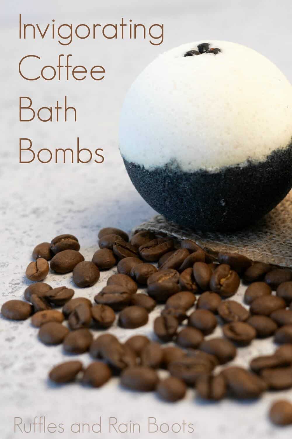 A single coffee bath bomb on a grey table with coffee beans and text which reads invigorating coffee bath bombs.