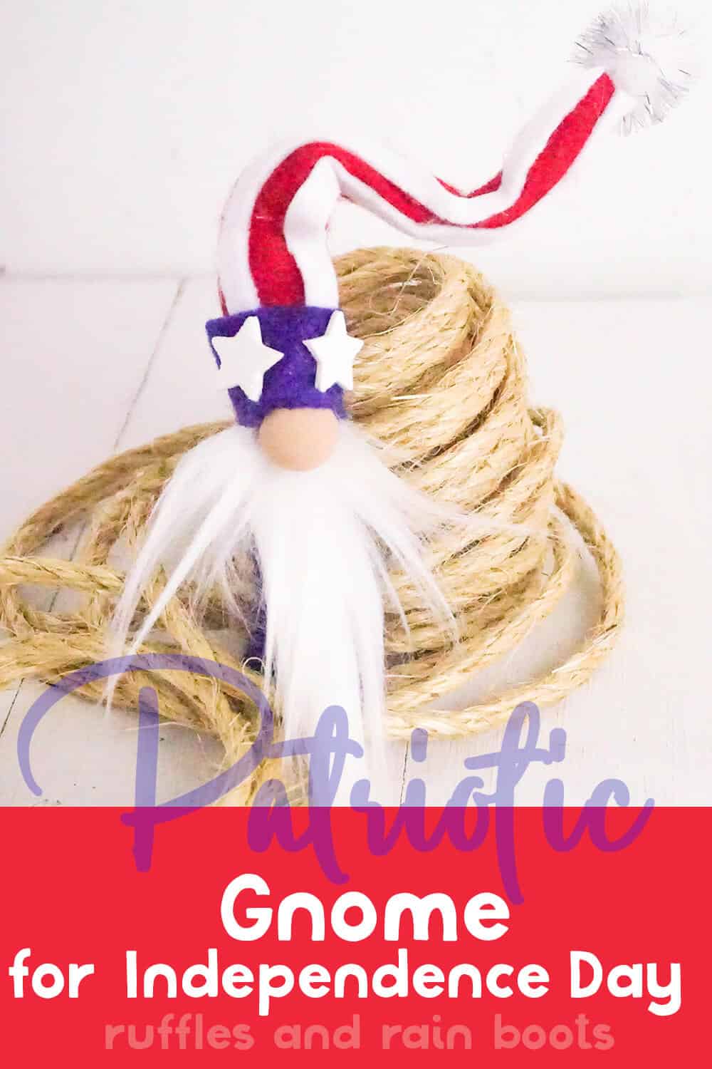 red white and blue gnome craft on a white wood table with a pile of twine with text which reads patriotic gnome for independence day