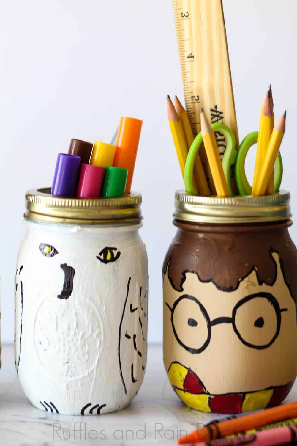 make harry potter school supplies with mason jars and paint on a white background