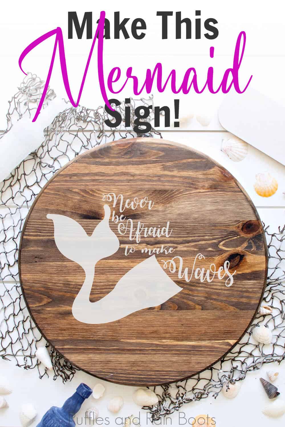 never be afraid to make waves free mermaid cut file on a round wood sign on a fishing net on a white wood background with sea shells, a blue bottle and oars scattered around with text which reads make this mermaid sign