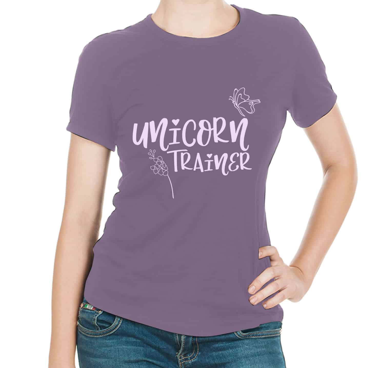 Unicorn Trainer free unicorn svg on a purple ladies t-shirt worn by a lady