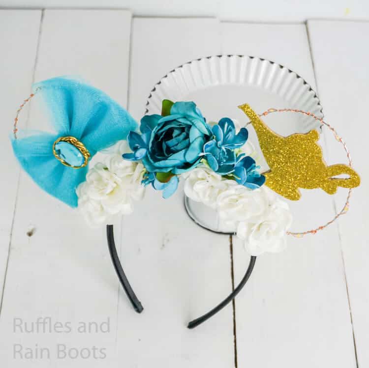 easy floral mickey ears princess jasmine on a white background leaning on a cupcake plate