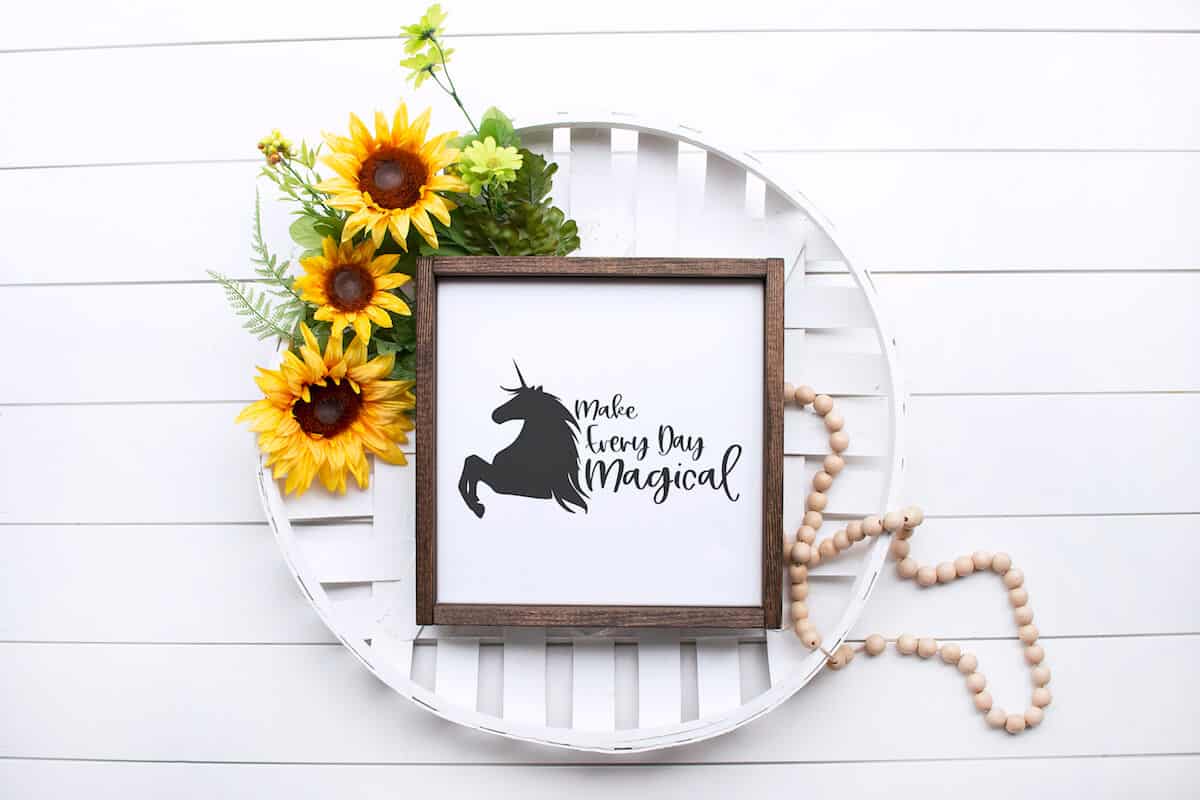 make everyday magical free unicorn cut file on pretty sunflower wall sign on a white wood background