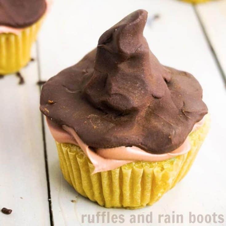 Hogwarts Sorting Hat Cupcakes on a white wood background