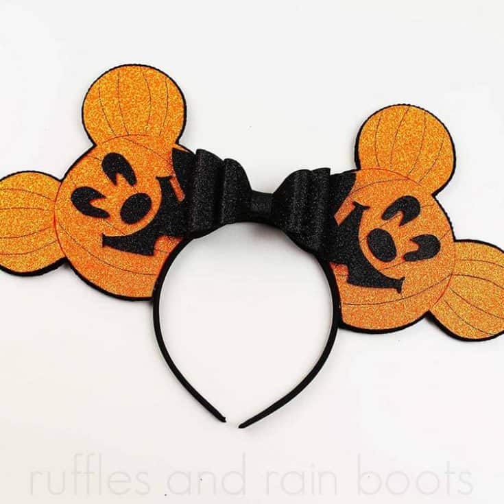 orange Mickey pumpkin head ears for Disney on white background with no text