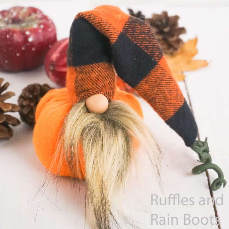 fall pumpkin fall gnome on a white wood background