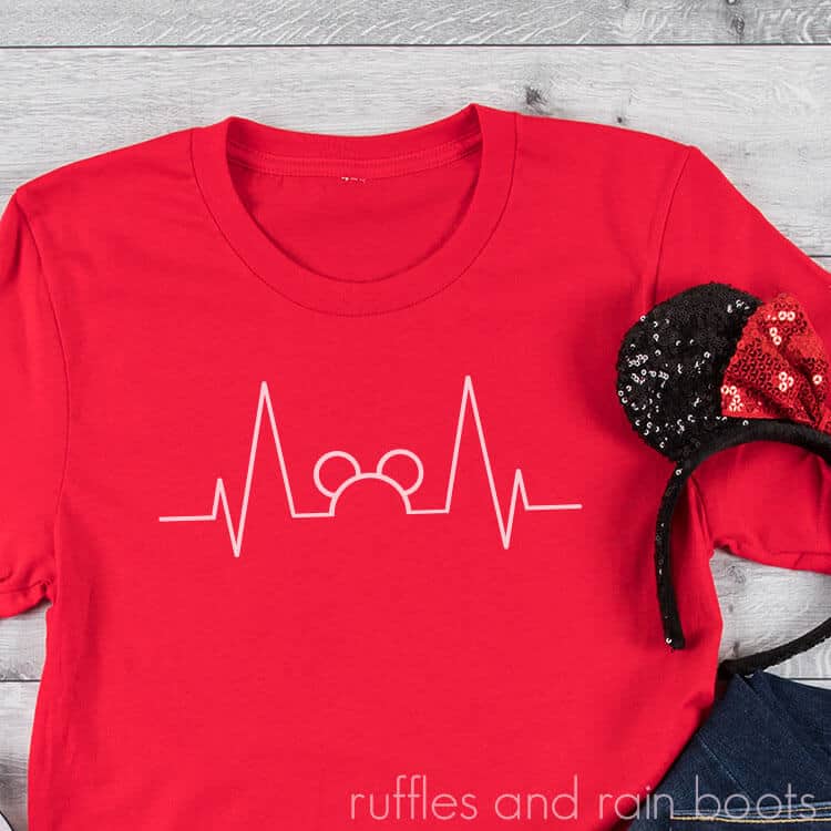 Free Mickey Heartbeat SVG on a red t-shirt on a white background