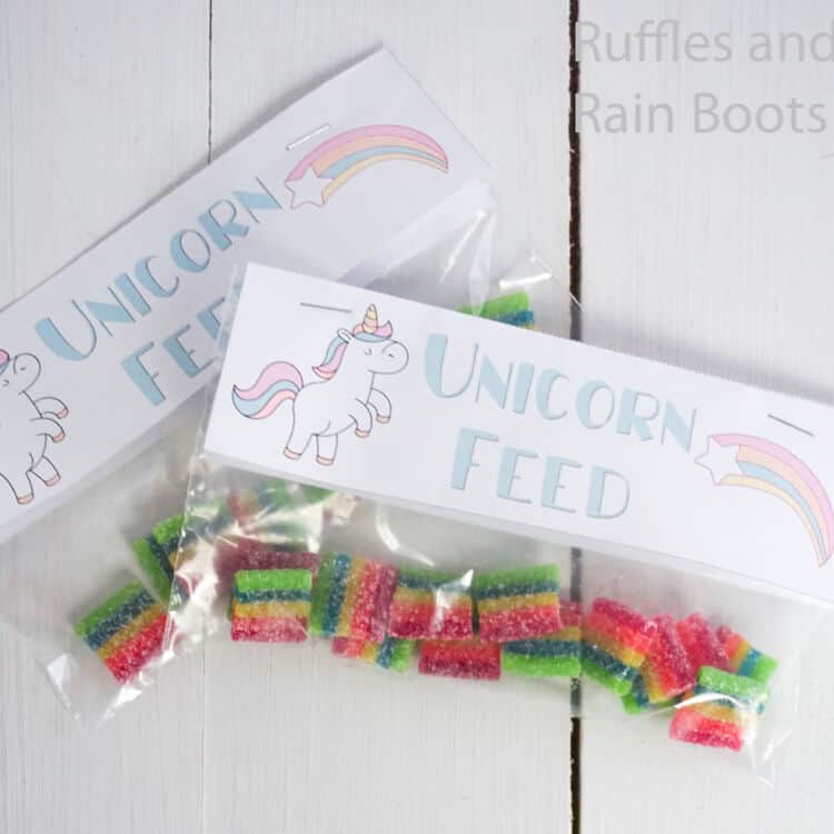 free printable kids snack back topper with unicorns on a white wood table