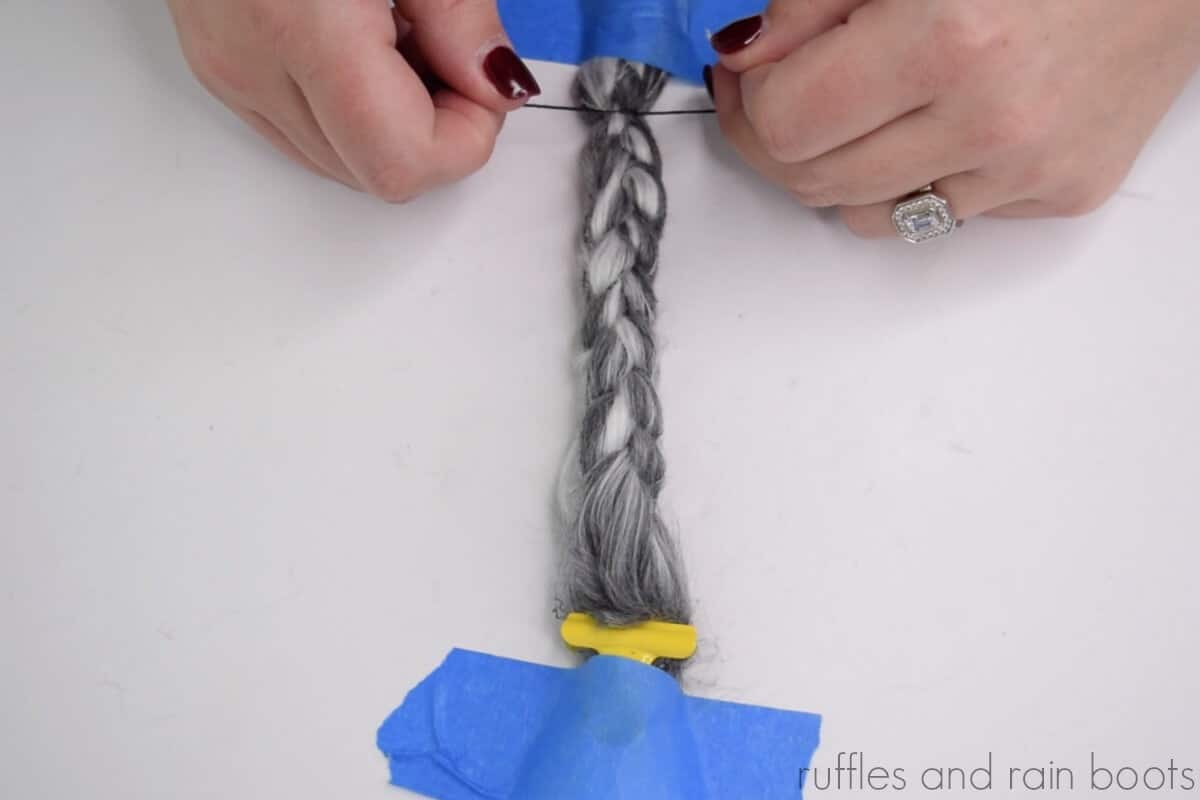 learn how to hide the tie of the braid