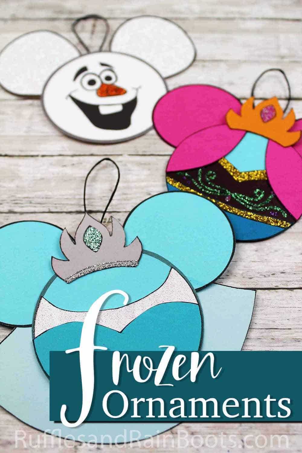 kid made frozen inspired christmas ornaments with text which reads frozen ornaments