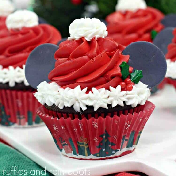 https://rufflesandrainboots.com/wp-content/uploads/2019/12/Santa-Hat-Mickey-Ear-Cupcakes-for-Christmas-S.jpg