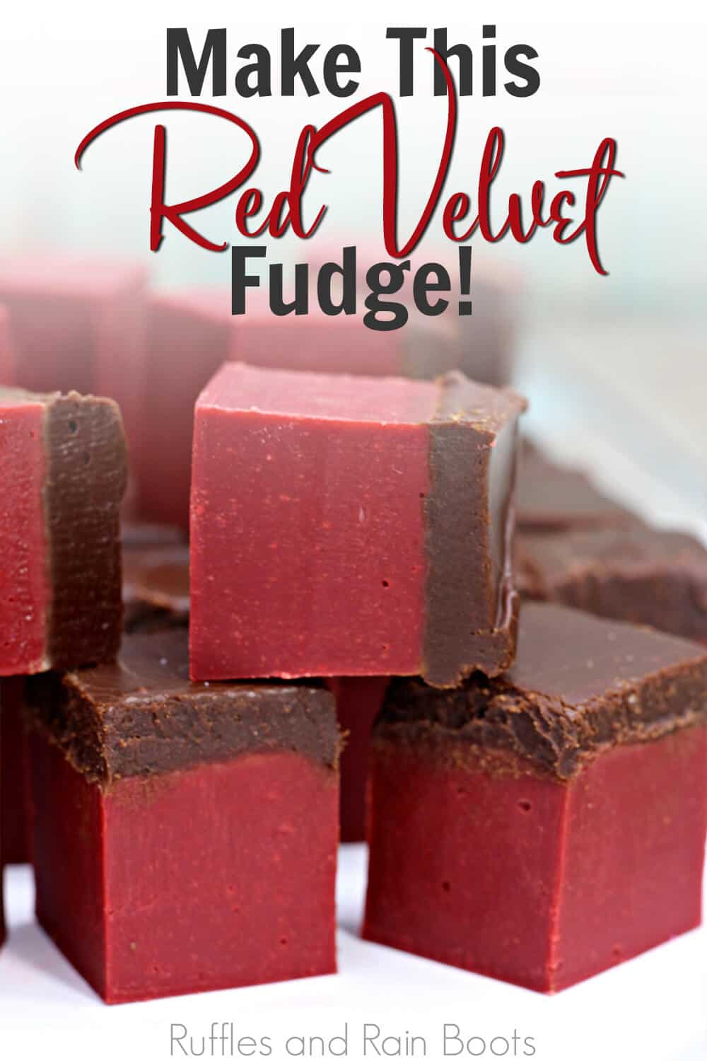 closeup of creamy red fudge with chocolate topping with text which reads make this red velvet fudge