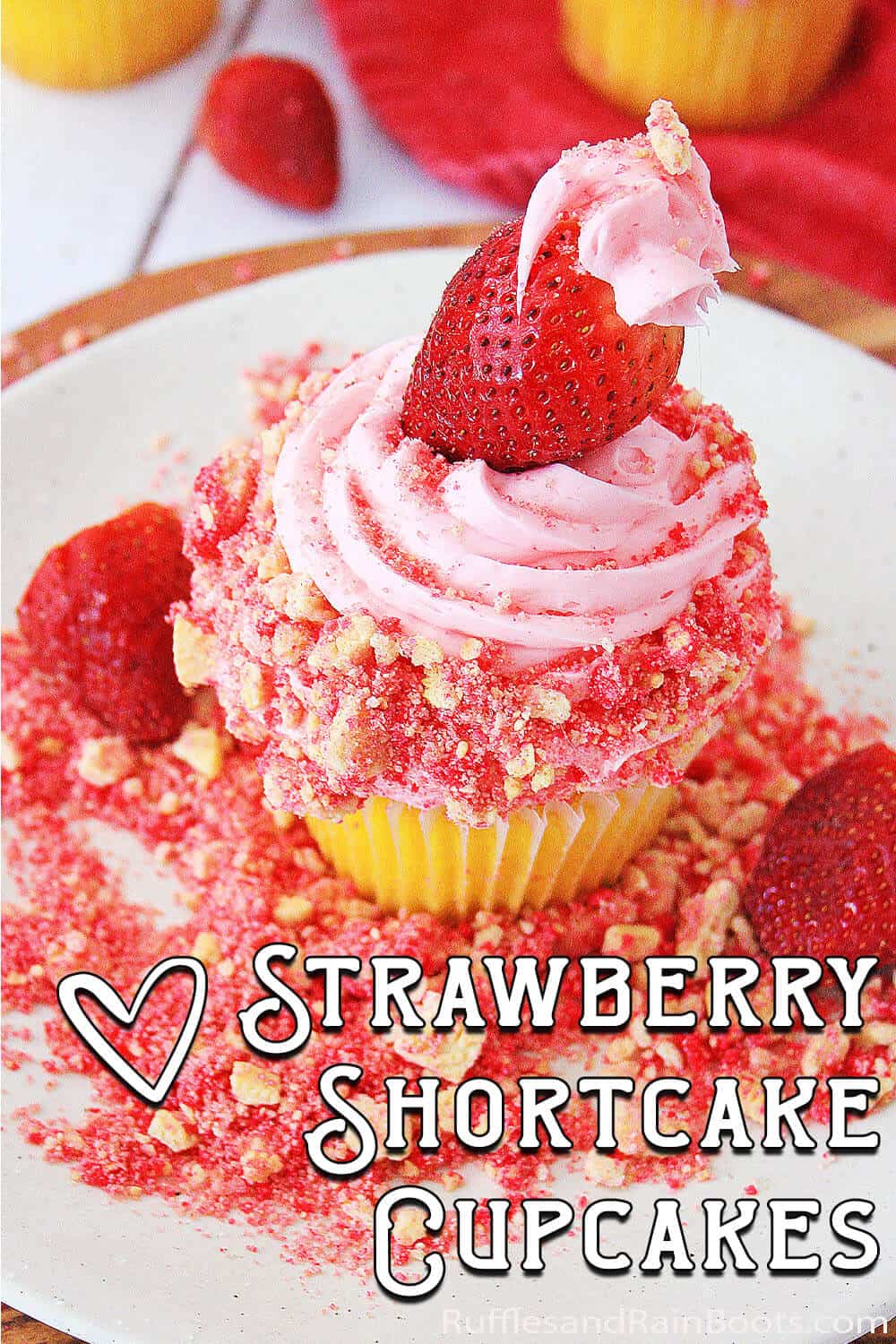 easy strawberries and cream cupcake decorating idea with text which reads strawberry shortcake cupcakes