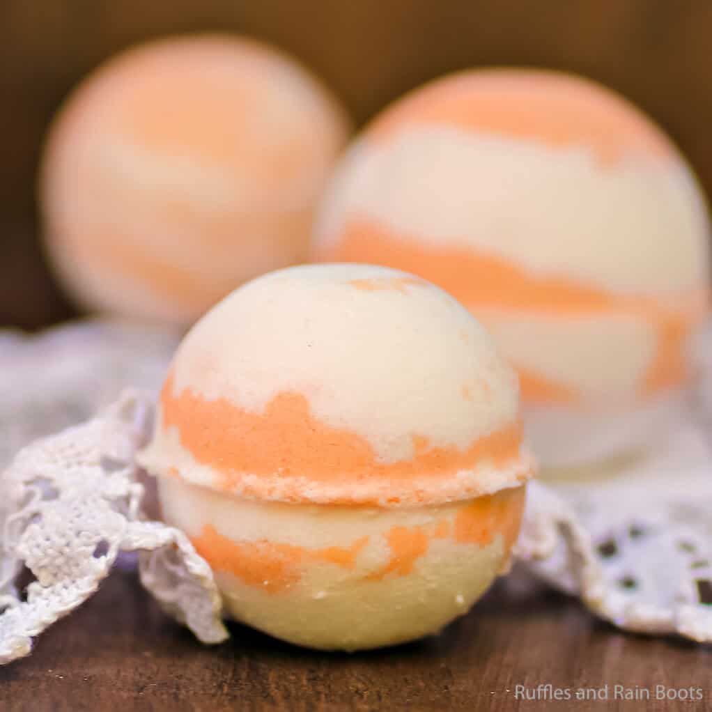 closeup of peaches and cream bath bombs on a table