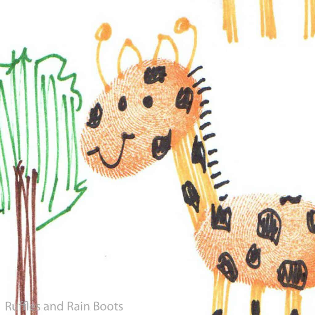 kid-made jungle thumbprint animal art