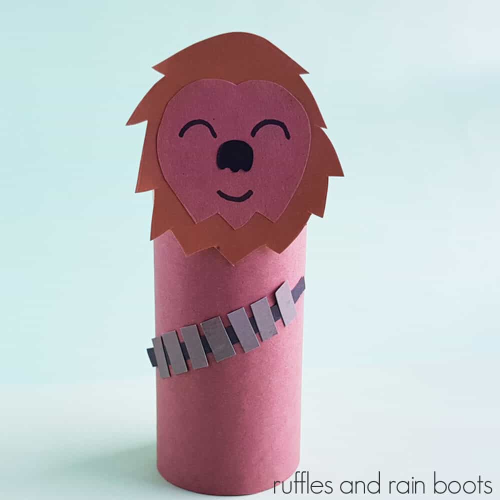 Square Image of Chewbacca paper craft on a light blue background.