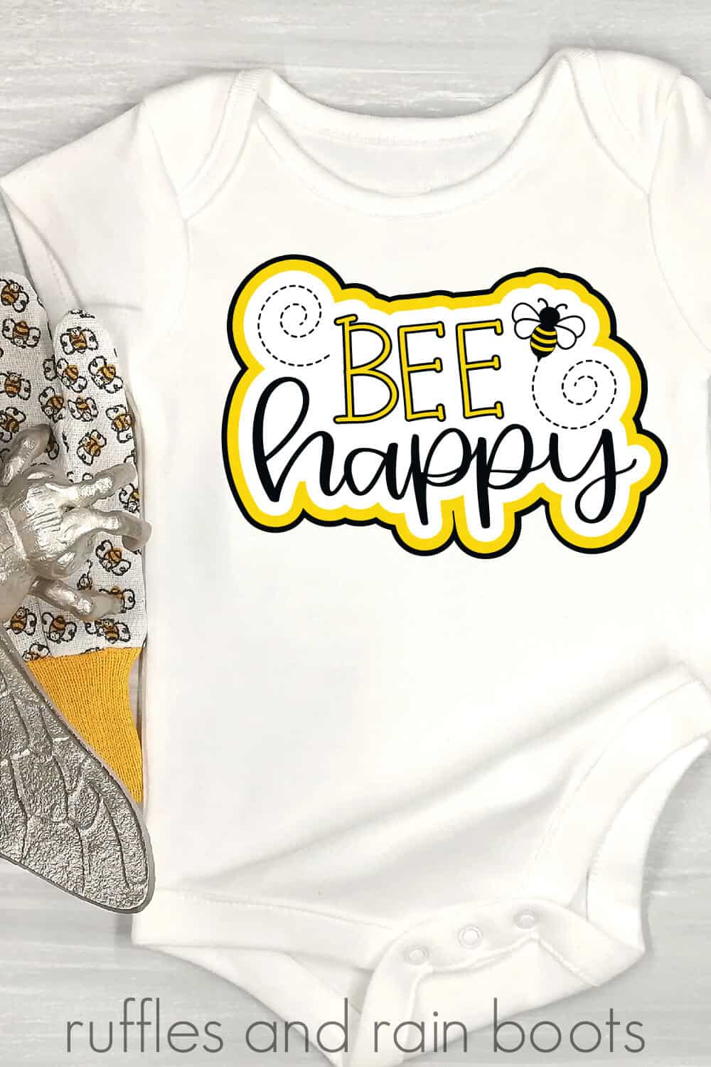 bee happy svg on white onesie for baby and bee accents